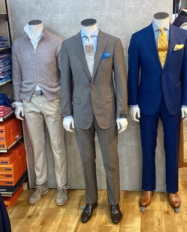 Current season menswear display at Demain